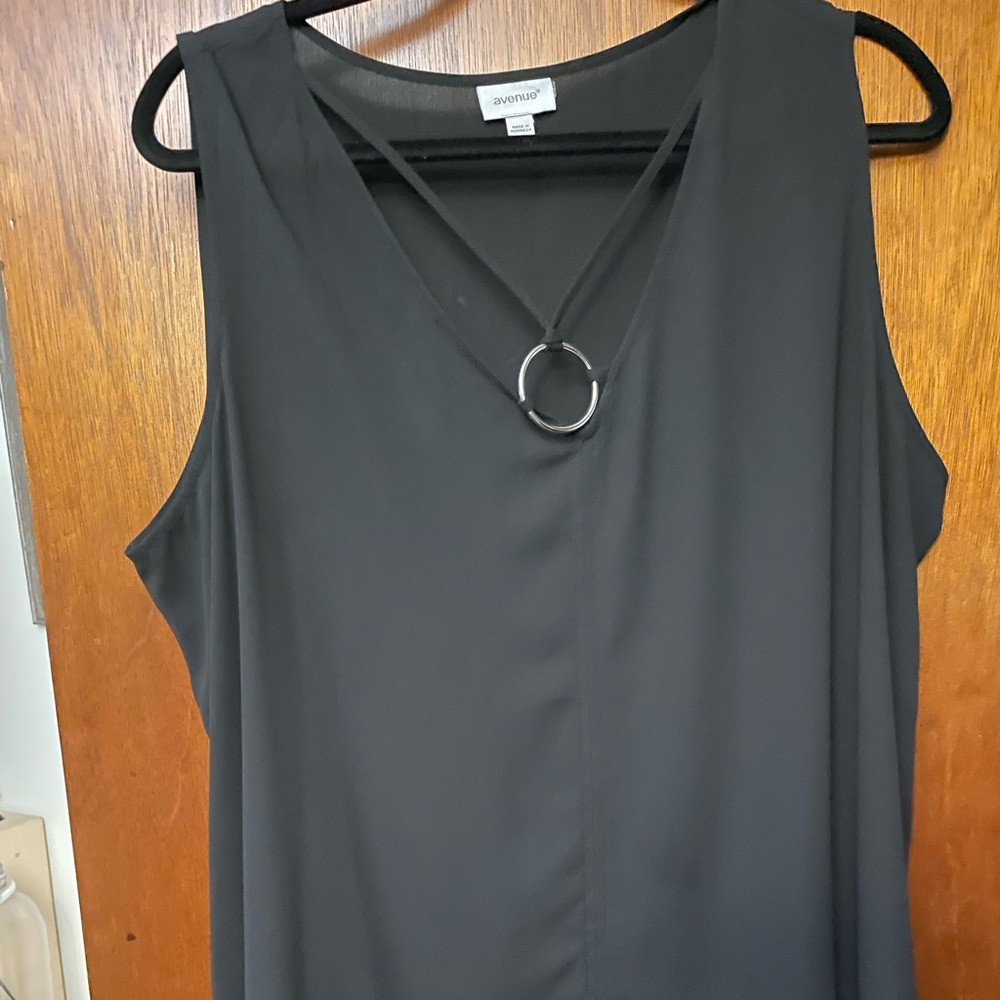 Black tank top with decorative neckline